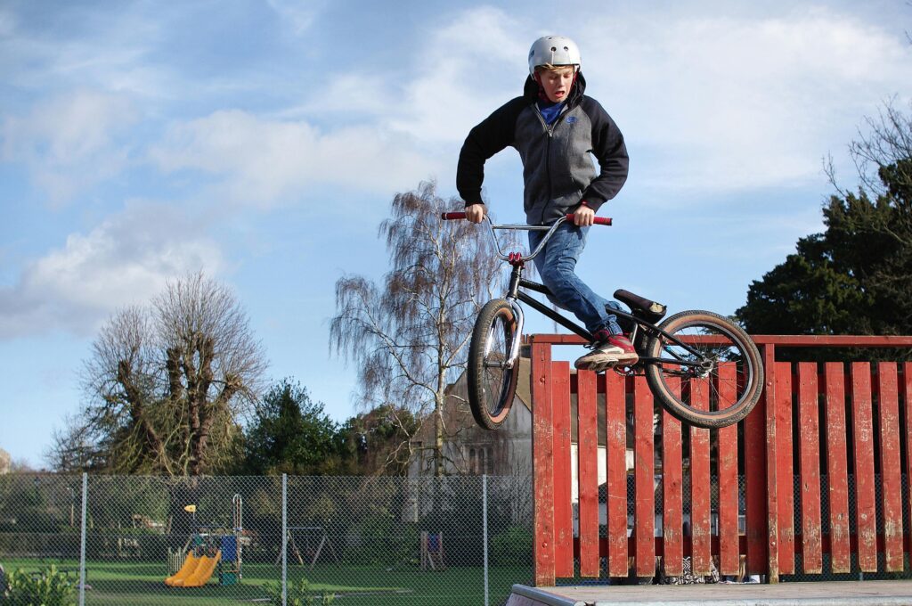 Exciting BMX trick performed by a young rider in a Hertfordshire skate park.